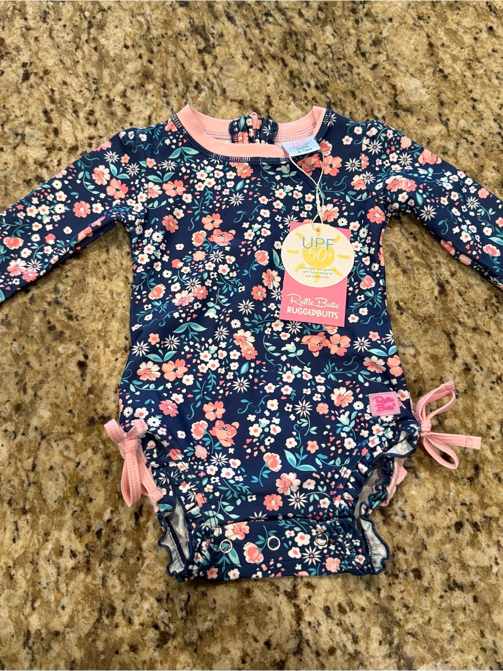 New Ruffle Butts Navy Floral Long-Sleeve UPF Swim One-Piece with Pink Accents